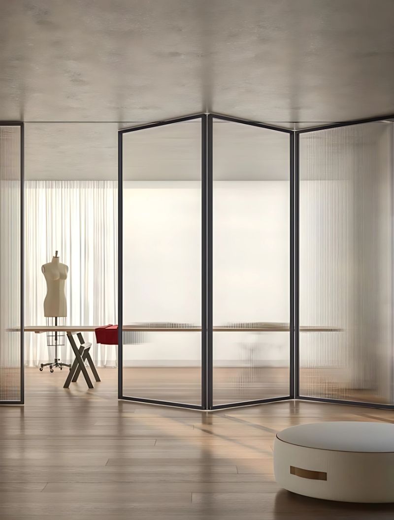 Slim aluminium bifolding glass doors installed in a modern Dubai interior by The Glass Company